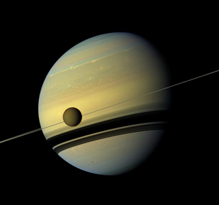 Saturn and Titan. (Image: NASA Jet Propulsion Laboratory/Cassini Orbiter)